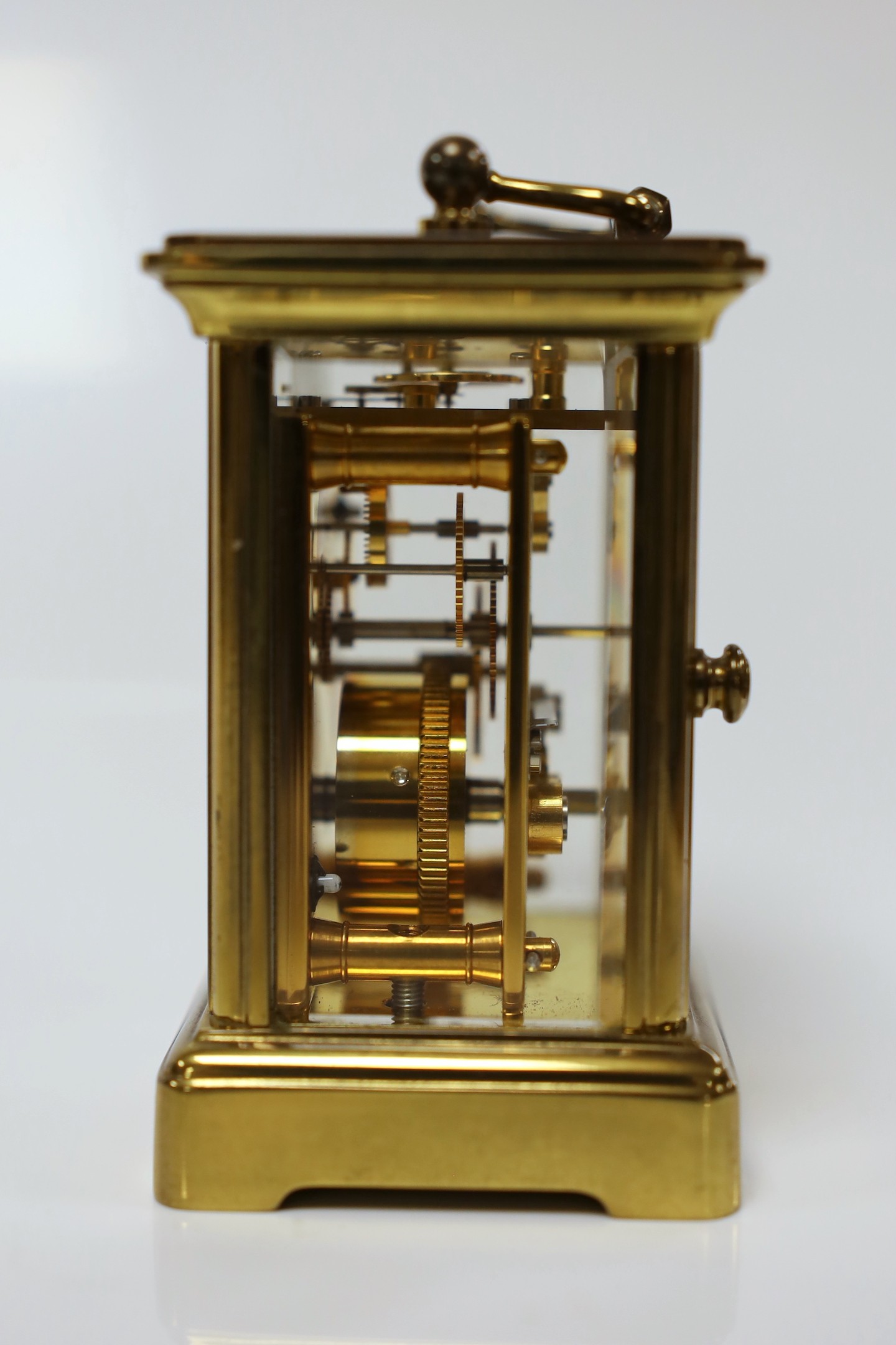 A Matthew Norman small brass carriage timepiece, 8cms high